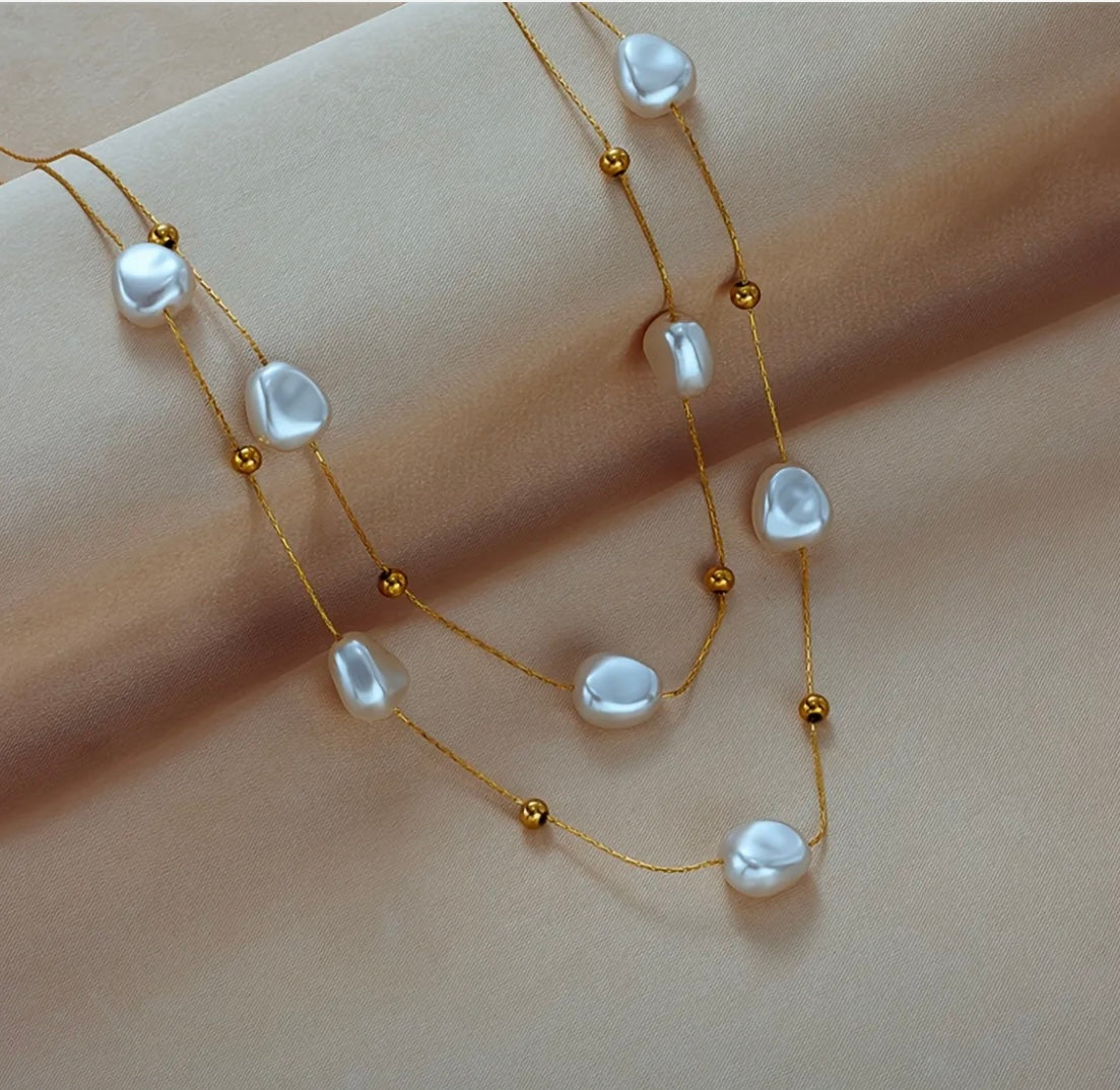 Double layered gold pearl necklace