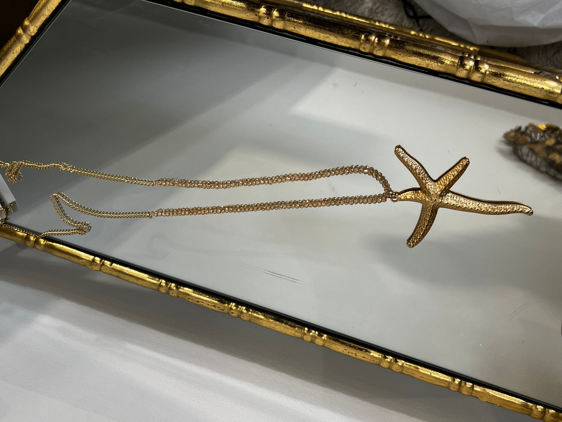 Elegant long star fish necklace