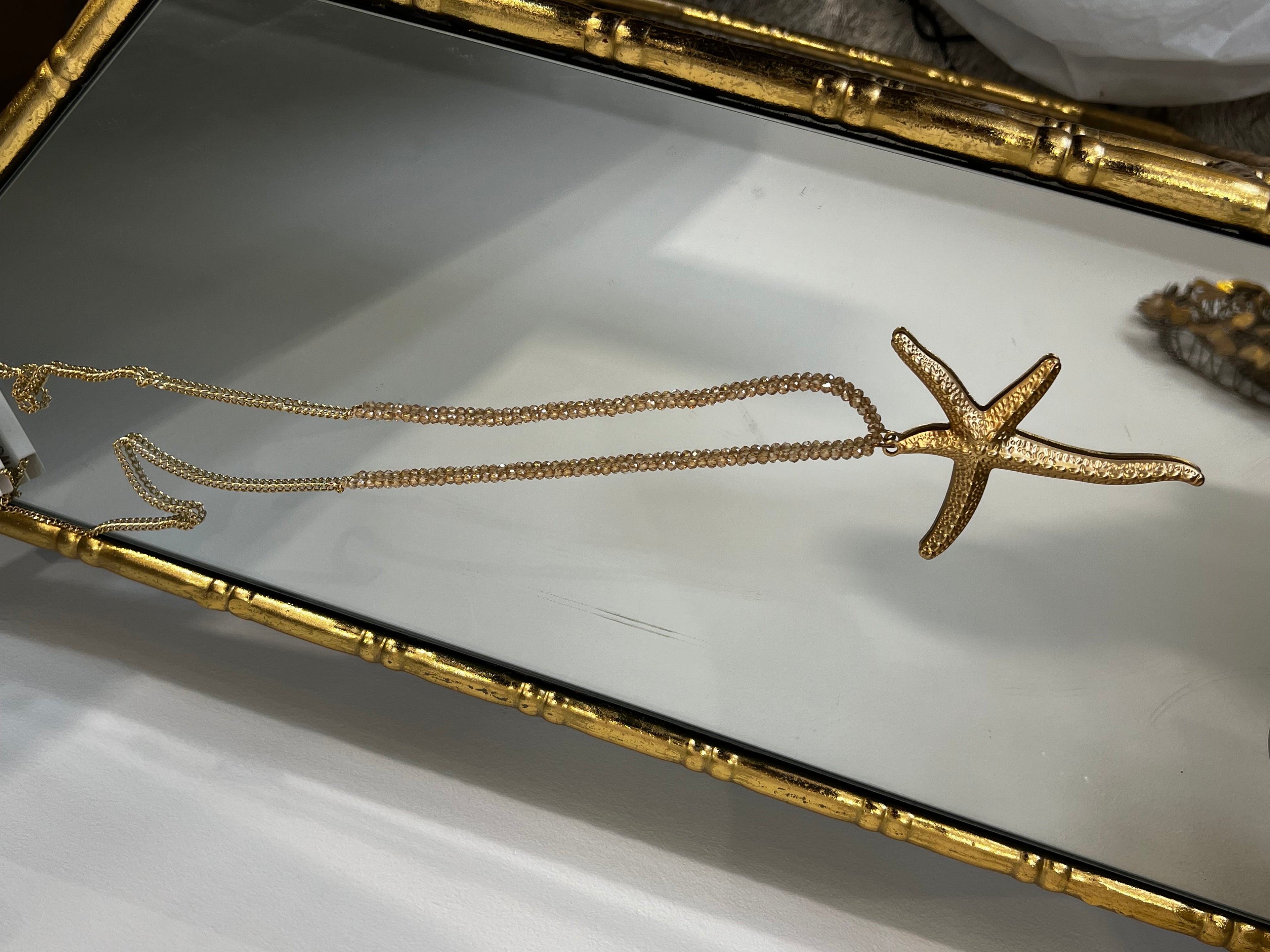 Elegant long star fish necklace