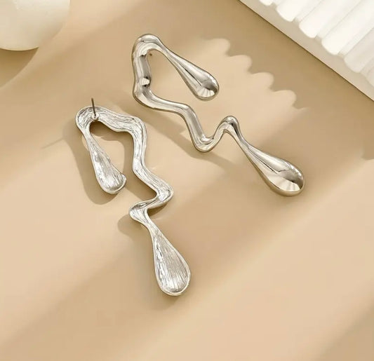Silver asymmetric earrings