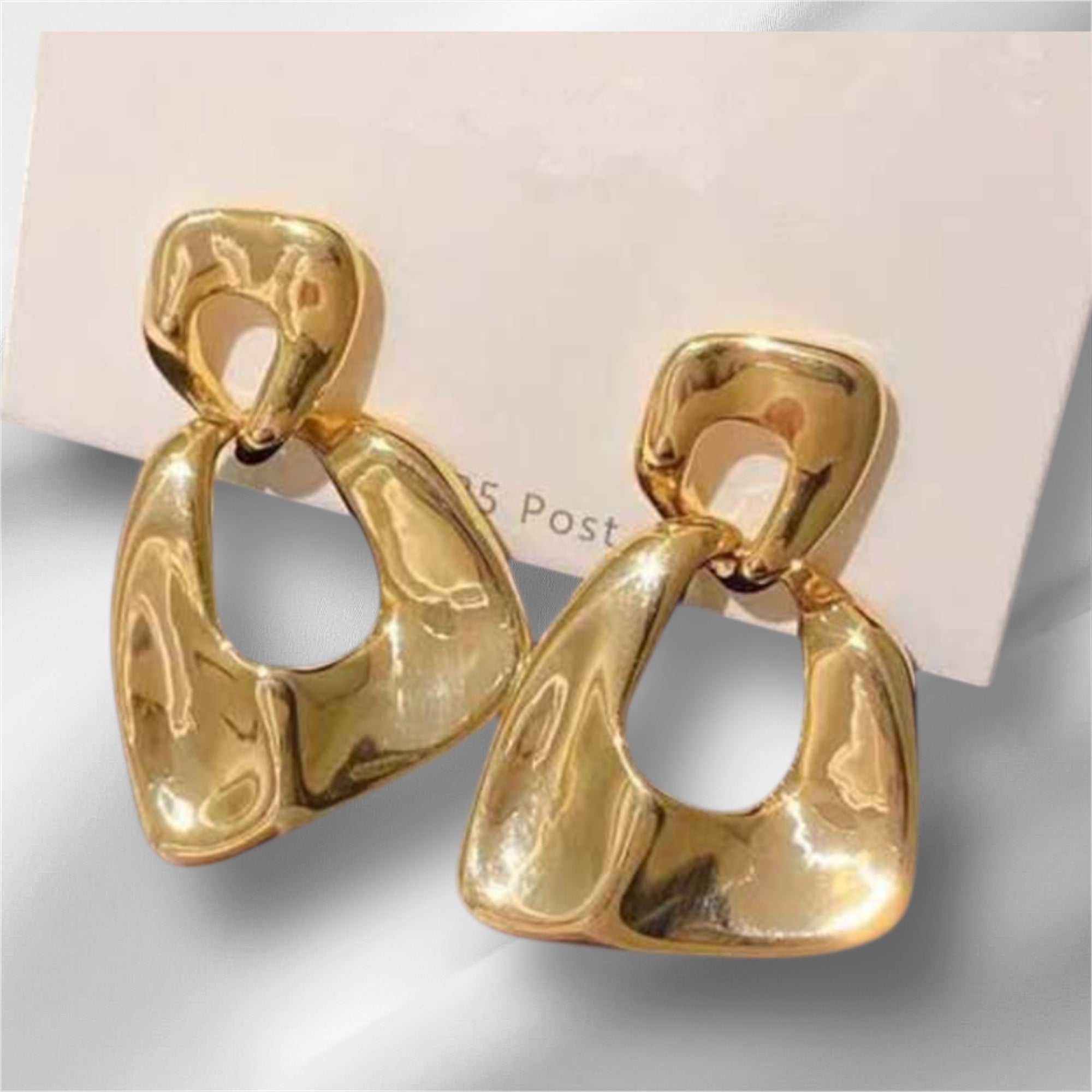 Gold swing earrings