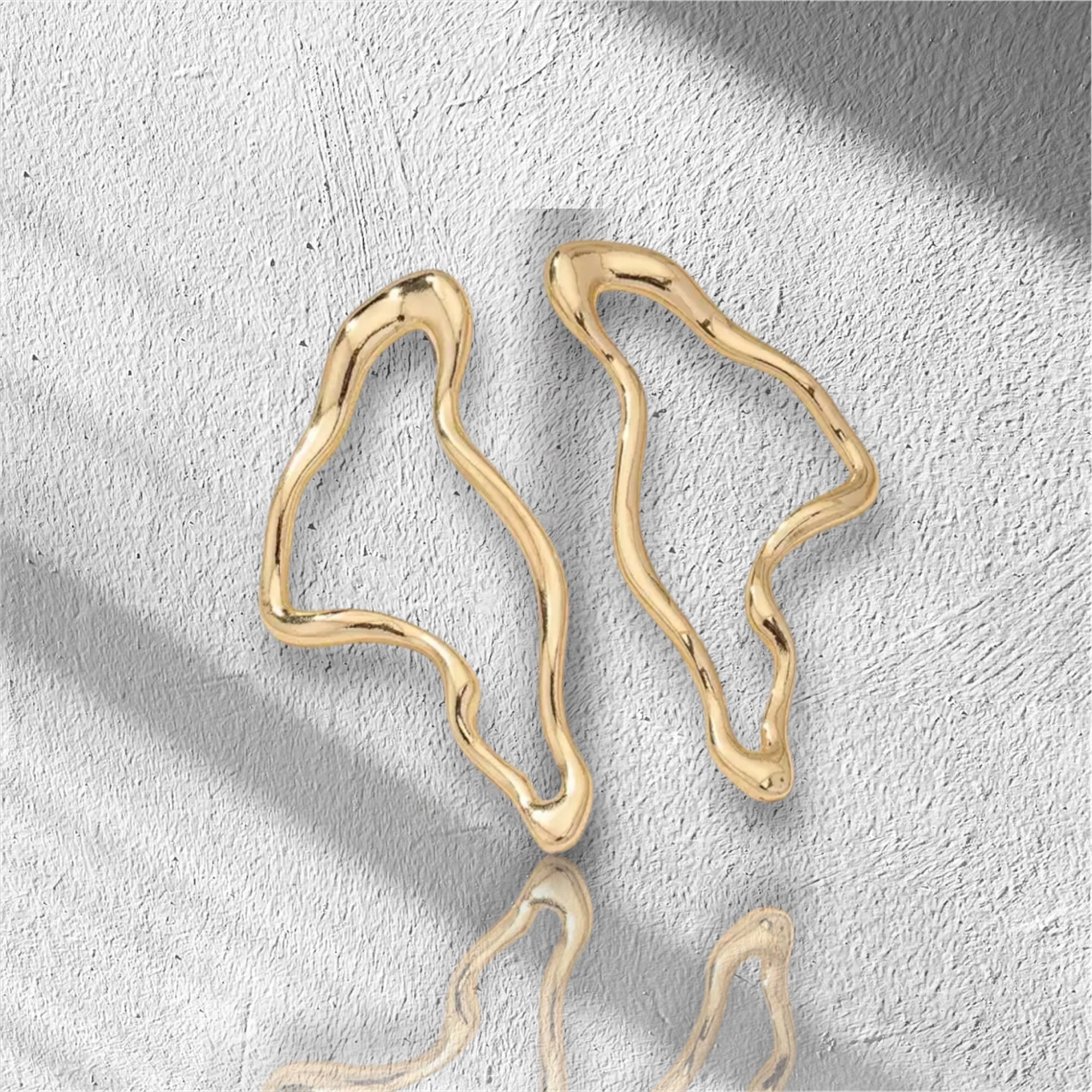 Elegant abstract Gold earrings